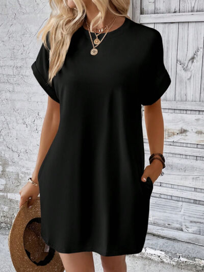 Experience the ultimate in comfort and style with our Mini Tee Dress. Designed with a round neck, short sleeves, and functional pockets, this dress is perfect for any occasion. Elevate your daily routine or dress it up for a special event. Versatility never looked so good!