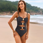 Enhance your beachwear selection with our Cutout Ruched Sweetheart Neck One-Piece Swimwear. The elegant ruched detailing and strategic cutouts enhance your curves, while the flattering sweetheart neckline adds a touch of sophistication. Take on your next beach day with confidence in this stylish and comfortable swimsuit.