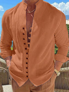 Unleash your bold, risk-taking side with this full-size button-front long sleeve shirt for men. The classic design is perfect for any occasion and the high-quality fabric offers both comfort and a flattering fit. Add this versatile and expertly tailored shirt to your wardrobe to elevate your style and boost your confidence!