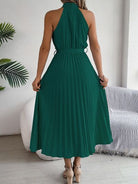 A perfect blend of elegance and timelessness, our Grecian Neck Tie Waist Pleated Dress exudes sophistication and luxury. The design boasts a Grecian-inspired neckline, complete with a chic neck tie and a flattering tied waist. The addition of a pleated skirt infuses a touch of femininity, truly making this dress a must-have for any special occasion. Elevate your wardrobe with this exquisite piece, exclusively available here.