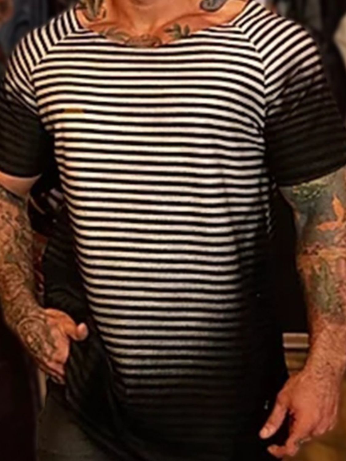 Step up your style game and tackle any obstacle with ease in our Men's Full Size Round Neck Short Sleeve Striped T-Shirt! With its bold round neck and classic striped design, this plus size shirt is the perfect choice for the adventurous man who's ready to take on the day. Embrace the challenge and make a statement with confidence.