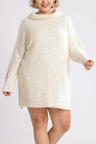 Indulge in elegance with Umgee's luxurious boucle sweater dress. The full-size fit and long sleeves keep you cozy while the unique bounce fabric adds texture and sophistication. Available in plus size for a perfect and flattering fit. Elevate your style with this exclusive piece.