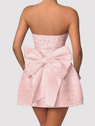 Experience the epitome of elegance with Cruisin Essentials Lace-Up Satin Mini Dress. Made from opulent satin, this dress boasts a charming lace-up front and graceful bow embellishment. Ideal for any noteworthy event, this dress exudes sophistication and exclusivity. Exude luxury with each and every step in this exquisite garment.