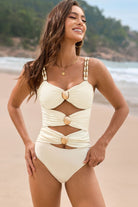 Enhance your swimwear lineup with our Cutout Ruched Sweetheart Neck One Piece! The attractive sweetheart neckline and well-placed cutouts highlight your figure, while the elegant ruched design adds a touch of sophistication. Definitely your next Cruisin Essentials beach excursion confidently in this fashionable and comfy swimwear.