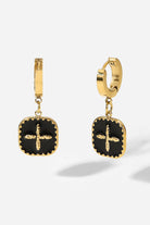 Elevate your outfit with our stunning Cross Square Drop Earrings! The bold black and gold contrast along with the unique square drop design and sleek cross detail will make a statement and add a touch of elegance to any look. Be inspired and make a statement with these eye-catching earrings!