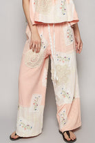 Elevate your style and comfort game with our Embroidered Drawstring Lace Patch Wide Leg Pants. The delicate lace patches and adjustable drawstring waist offer a perfect blend of elegance and fit. Made with wide legs for a flowy silhouette, these pants are perfect for any occasion.