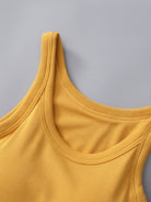 Constructed with premium materials and featuring a seamless design, this round-neck tank includes a convenient built-in bra for maximum comfort and support. Whether for daily wear or athletic pursuits, this mustard tank provides both functionality and a polished aesthetic.