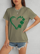 Express your love for luck with our Heart Lucky Clover T-Shirt! Made with a round neck and short sleeves, this soft and stylish t-shirt showcases a heart and clover design, perfect for adding a touch of luck to any outfit. Wear it casually or dress it up for a fun and charming look!