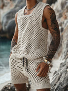 Unleash your bold and adventurous side with our Men's Plus Size Hollow Out Round Neck Tank and Shorts Set. Made for those who dare to be different, this edgy ensemble features a wide mesh-look design that is sure to turn heads. Don't be afraid to stand out in style!