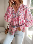 Elevate your wardrobe with our Bohemian Tie Neck Lantern Sleeve Blouse! Add a touch of bohemian elegance to any outfit with the trendy tie neck and lantern sleeves. Perfect for any occasion, channel your inner free spirit with this stylish and versatile piece.