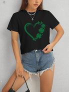 Express your love for luck with our Heart Lucky Clover T-Shirt! Made with a round neck and short sleeves, this soft and stylish t-shirt showcases a heart and clover design, perfect for adding a touch of luck to any outfit. Wear it casually or dress it up for a fun and charming look!