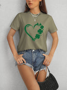 Express your love for luck with our Heart Lucky Clover T-Shirt! Made with a round neck and short sleeves, this soft and stylish t-shirt showcases a heart and clover design, perfect for adding a touch of luck to any outfit. Wear it casually or dress it up for a fun and charming look!