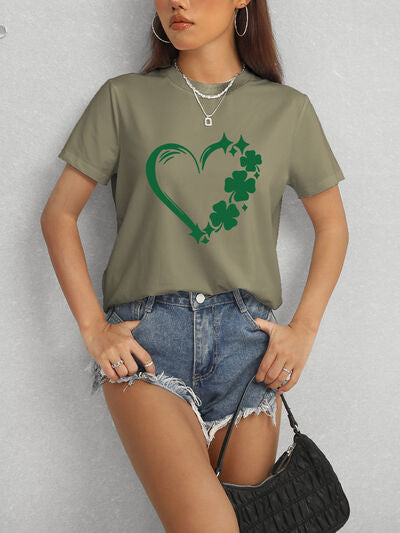 Express your love for luck with our Heart Lucky Clover T-Shirt! Made with a round neck and short sleeves, this soft and stylish t-shirt showcases a heart and clover design, perfect for adding a touch of luck to any outfit. Wear it casually or dress it up for a fun and charming look!