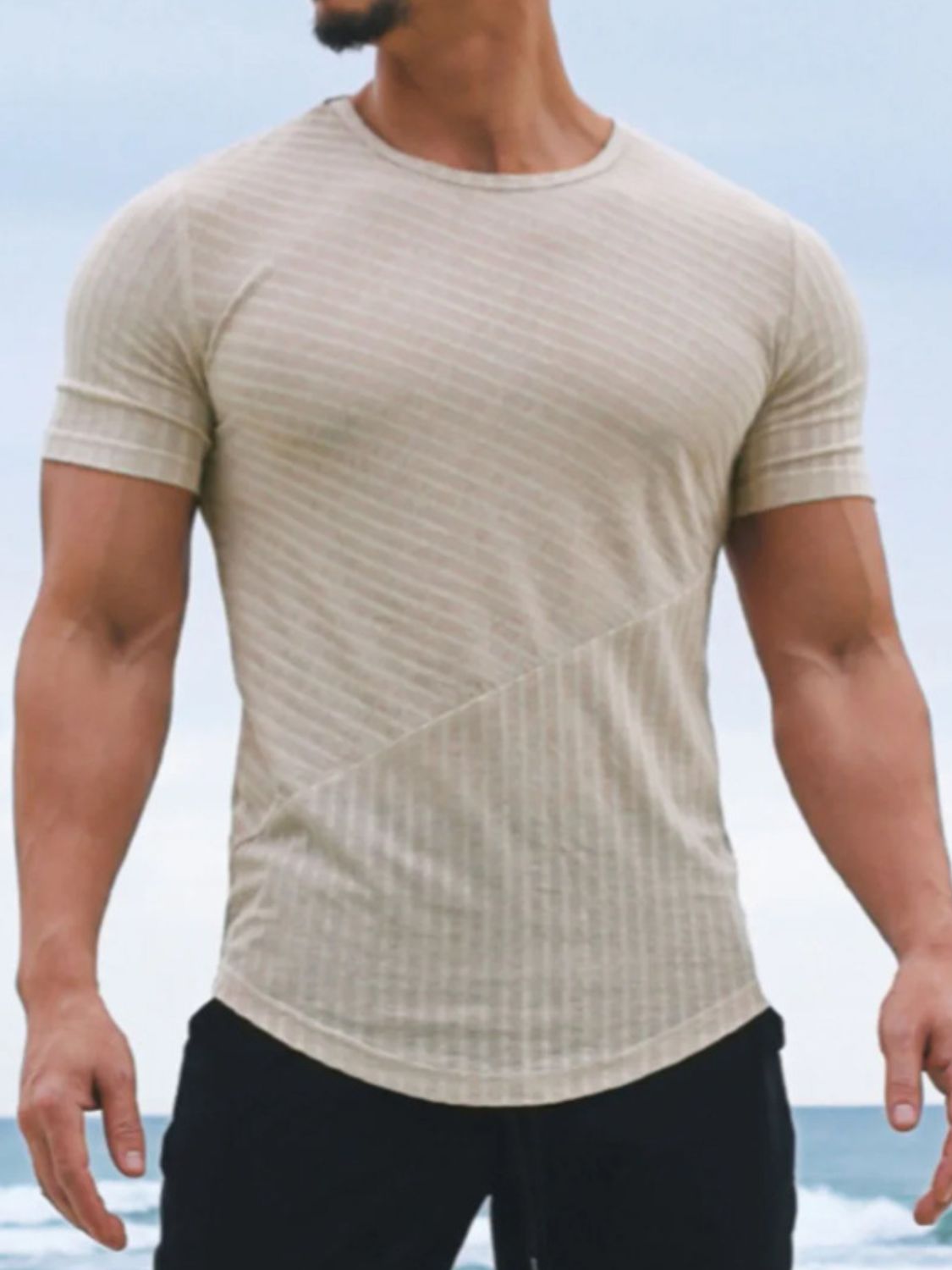 This Men's Striped T-Shirt is the perfect addition to any wardrobe. With high-quality fabric, it's both comfortable and durable, while the classic design and stylish stripes add a touch of sophistication to any casual look. Ideal for any occasion.