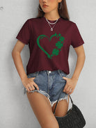 Channel good luck and style with our Heart Lucky Clover T-Shirt. Its round neck and short sleeves offer comfort while the heart and clover design adds a lucky touch to any outfit. Perfect for casual wear or dressing up, this soft and stylish shirt is a must-have in your wardrobe.