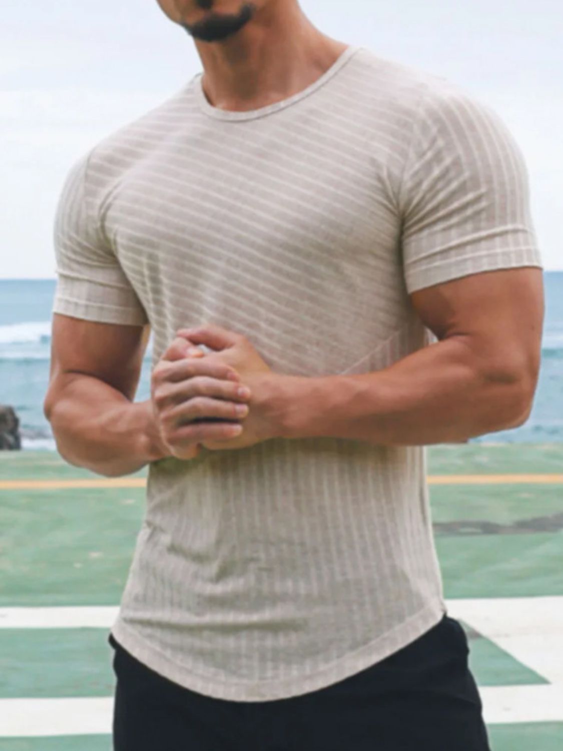 Crafted from top-quality fabric, this Men's Round Neck Short Sleeve Striped T-Shirt is a must-have for any closet. Its timeless round neck and short sleeve style make it perfect for any casual outfit, while the refined stripes add a touch of elegance. Durable and comfortable, this t-shirt is ideal for any event.