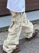 Introducing our Khaki Wide Leg Jeans with Cargo Pockets by Cruisin Essentials. These pants are the perfect blend of fashion and functionality, with a wide leg design for effortless style and cargo pockets for added convenience. Elevate your wardrobe and stand out from the crowd with these luxurious and exclusive pants.