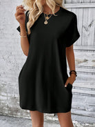 Experience the ultimate in luxury and versatility with our Mini Tee Dress. This stylish and comfortable dress features a round neck, short sleeves, and convenient pockets, making it perfect for any occasion. Elevate your wardrobe and effortlessly stand out whether you're running errands or attending a chic event.