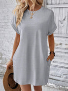 Introducing the Mini Tee Dress, the perfect combination of style and comfort. This luxurious dress features a round neck, short sleeves, and convenient pockets for functionality. From running errands to attending a chic event, elevate your look effortlessly with this versatile addition to your wardrobe!