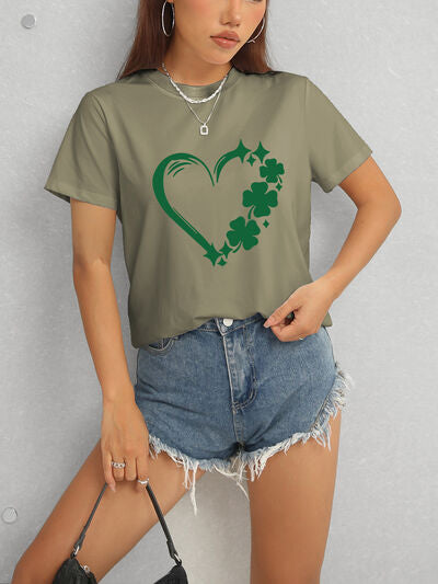 Express your love for luck with our Heart Lucky Clover T-Shirt! Made with a round neck and short sleeves, this soft and stylish t-shirt showcases a heart and clover design, perfect for adding a touch of luck to any outfit. Wear it casually or dress it up for a fun and charming look!