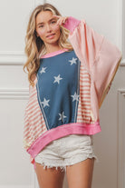 Introducing the bold and adventurous Stars and Stripes Round Neck Long Sleeve Top from Cruisin Essentials! Tap into your daring side with this statement piece, perfect for adding a touch of risk-taking to any outfit. Don't miss out on this must-have top!