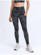 Crafted by industry experts, these Double Take Wide Waistband Leggings with Pockets by Trendsi Trends are ideal for the style-conscious individual.