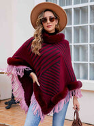 This fashionable Fringe Poncho, offered by Trendsy Trends, comes in a variety of colors and showcases delicate trims for a comfortable and chic addition to any outfit.